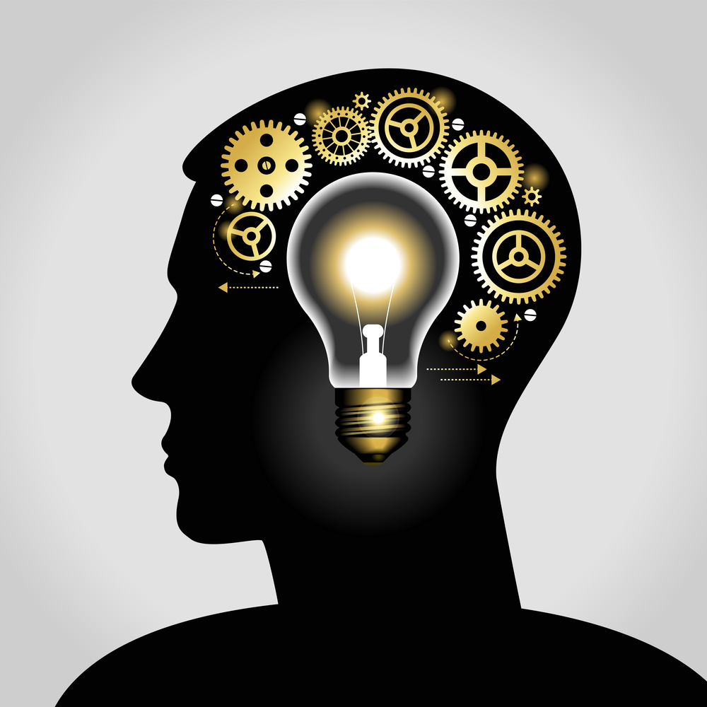 silhouette of a man’s head with a glowing light bulb, and gears. silhouette of a man's head with a glowing light bulb, and gears. the concept of making big idea. File is saved in AI10 EPS